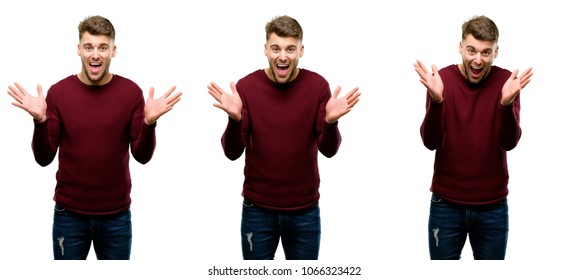 Handsome blond man happy and surprised cheering expressing wow gesture isolated over white background - Shutterstock ID 1066323422