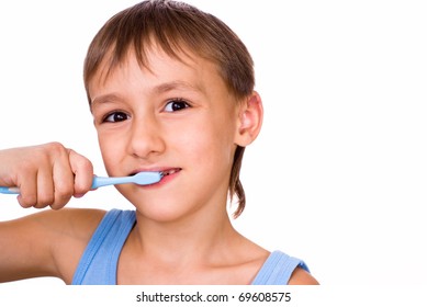 Handsome Boy Brushing His Teeth On Stock Photo 69608575 | Shutterstock