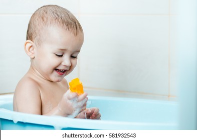 Handsome boy preschooler bathing in the bathroom clean and hygienic
