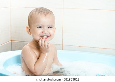 Handsome boy preschooler bathing in the bathroom clean and hygienic