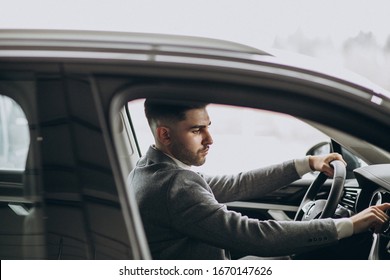 Handsome Business Man Driving In Car