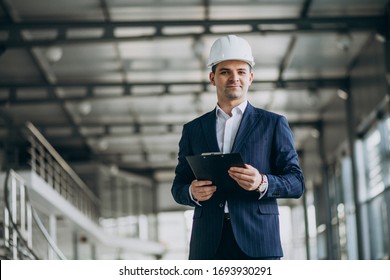 Handsome Business Man Engineer In Hard Hat In A Building