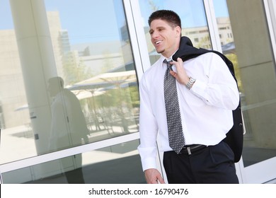 A Handsome Business Man Outside Office Building Leaving For The Day