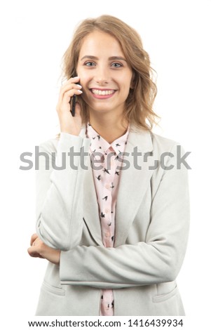Handsome business woman speaking on the phone