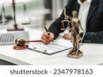 Handsome businessman lawyer of Indian descent. trusted litigation lawyers attorneys. most commonly referred to litigator, helping clients civil law services in all aspects of civil litigation cases