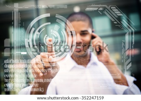 Handsome businessman pointing finger to camera and slicking virtual button, finger is in focus while his face is out of focus. Shallow depth of field.
