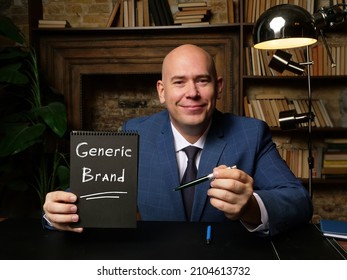 A Handsome Businessman Showing A Blank Piece Of Paper With Sign Generic Brand . 
