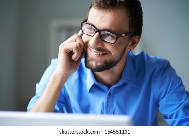 Handsome Businessman Speaking On The Phone