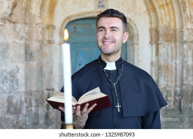 Handsome Catholic Priest Smiling In Church 