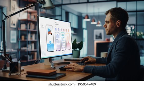 Handsome Caucasian Male Designer Working on Desktop Computer in Creative Living Room. Freelance Male is Developing New Food Delivery App Design, User interface in a Digital Graphics Editing Software. - Shutterstock ID 1950547489