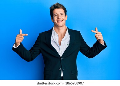 Handsome caucasian man wearing business suit and tie looking confident with smile on face, pointing oneself with fingers proud and happy. 
