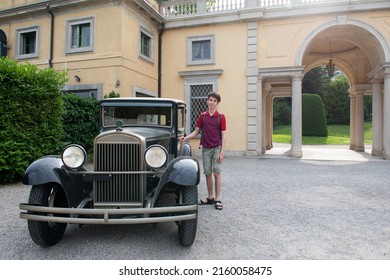 Handsome Cheerful Teen Boy Near Retro Car, Summer Outdoor