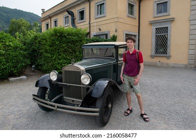 Handsome Cheerful Teen Boy Near Retro Car, Summer Outdoor