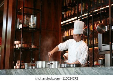 Handsome chef cook delicious food, Thailand - Powered by Shutterstock