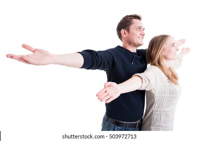 Handsome couple posing like being on Titanic isolated on white background with copy text space