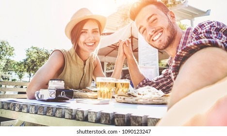 Handsome Couple Taking Selfie With Mobile Smart Phone Camera - Young Fashion Tourist Making Photo Souvenir While Eating Meal At Bar Street Food Restaurant - Vacation, Travel Lifestyle And Love Concept