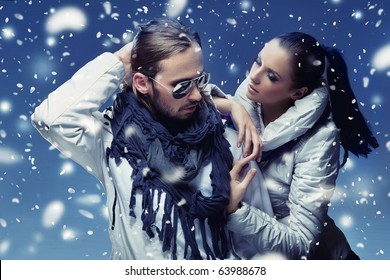 Handsome Couple In Winter Snow