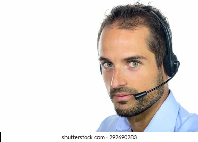 Handsome customer service operator wearing a headset on white background