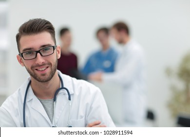 Handsome Doctor On Blurred Background