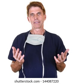 Handsome Doctor Wearing Navy Blue Scrubs With A Concerned Expression On His Face Isolated On White