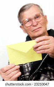 Handsome Elderly Man Opening Letter Envelope