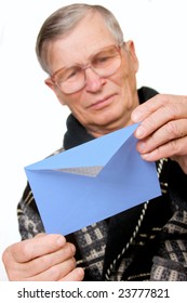 Handsome Elderly Man Opening Letter Envelope