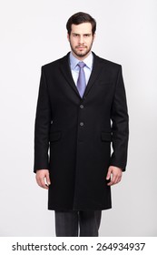 Handsome Elegant Man With Beard In Black Overcoat, Isolated