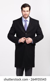 Handsome Elegant Man With Beard In Black Overcoat, Isolated