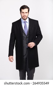 Handsome Elegant Man With Beard In Black Overcoat, Isolated