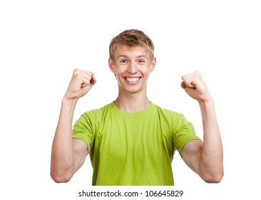 handsome excited man happy smile looking at camera, hold arm hands fist raised up gesture, young guy wear green t shirt, white teeth, isolated over white background