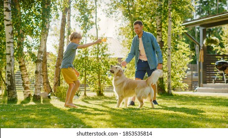 Handsome Father and Son Spend Quality Family Time Together, Play Soccer with Football, Passing to Each other, and Having Fun. Sunny Day Idyllic Suburban Home Backyard with Loyal Golden Retriever Dog - Powered by Shutterstock