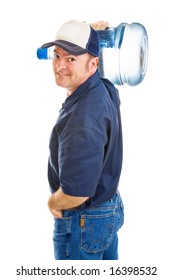 Handsome, Friendly Water Delivery Man Carrying A 5 Gallon Jug On His Shoulder.  Isolated On White.