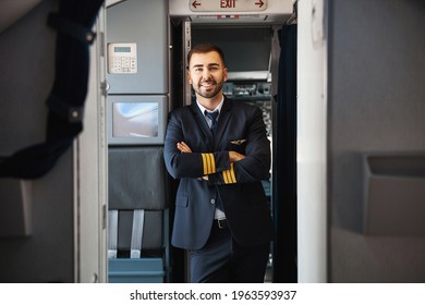 Handsome Friendly Young Pilot Having Rest After The Flight