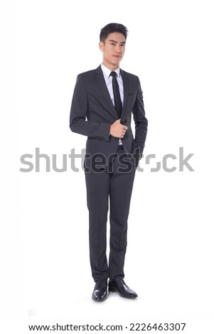 Handsome full body young business man
wear suit ,white shirt with tie ,,Businessman portrait Isolated on white background
