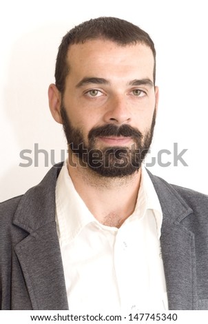 Handsome guy with beard and jacket on white background