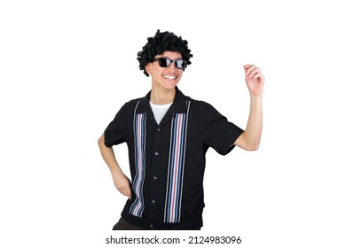 Handsome Guy Dancing Wearing An Afro Wig. Isolated On White Background. Latin 18-20 Years Old Guy.