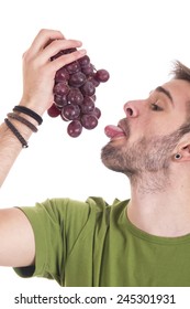 Handsome Guy Licking Bunch Of Grapes