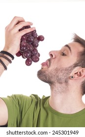 Handsome Guy Licking Bunch Of Grapes