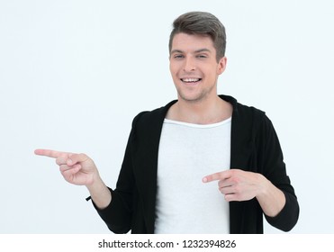 handsome guy pointing to the side at copy space