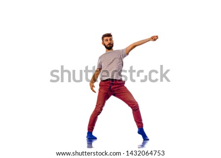 Handsome guy prepare for breakdancing on white background