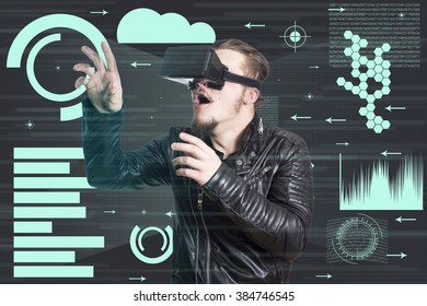 Handsome guy using VR glasses