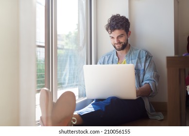 Handsome Hipster Modern Man Designer Working Home Using Laptop At Home