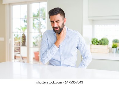 Handsome Hispanic Business Man Touching Painful Neck, Sore Throat For Flu, Clod And Infection