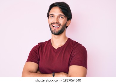 Handsome Hispanic Man Wearing Casual Clothes Happy Face Smiling With Crossed Arms Looking At The Camera. Positive Person. 