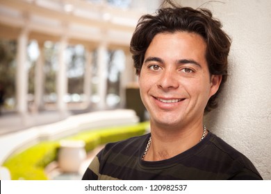 Handsome Hispanic Young Adult Man Portrait Outdoors.