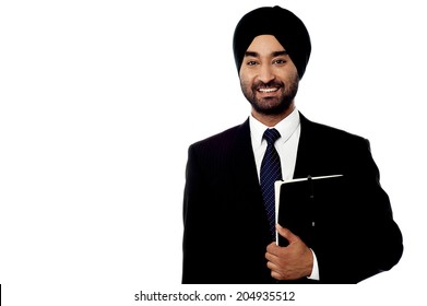Handsome Indian Businessman Holding A Folder