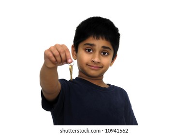 An Handsome Indian Kid Handing Over Keys