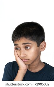 An Handsome Indian Kid Looking Very Sad