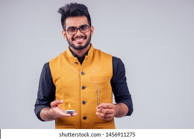 Handsome Indian Male Tradition Dress Prayers Candle Happy Diwali Light Studio White Background.