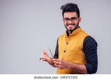 Handsome Indian Male Tradition Dress Prayers Candle Happy Diwali Light Studio White Background.